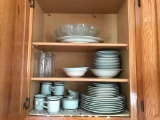 Cabinet Lot Next to Refrigerator with Mostly a Set of Japanese Stoneware Dishes