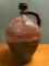 Southwest Style Pottery Handled Jug/Vessel. Has Mark on Bottom That Says O.P.C.N. Has a Hole in the