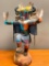 This is what appears to be a Road Runner Kachina Doll, Hand Crafted from Wood and Stands 23