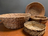 Four Southwest Style Handmade Baskets. The Largest is 5