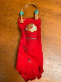 Southwest Style Hanging Plastic Faced Baby. This Item is 9