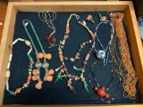 Wooden Display Case with Southwest Style Handmade Jewelry. The Case is 21