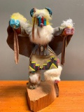 This is what appears to be a Road Runner Kachina Doll, Hand Crafted from Wood and Stands 14