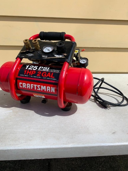 Craftsman 1 HP, 2 Gal., 125 PSI Portable Air Compressor. This Item has Been Used. _ As Pictured