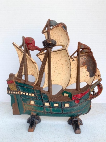 Cast Iron Ship Doorstop. This Item is over 11" Tall and the Paint is Chipping - As Pictured