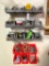 Contents of Peg Board Above Workbench and Plastic Bins Next to It