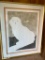 Framed Artwork of a Snowy Owl signed and Numbered and is 26