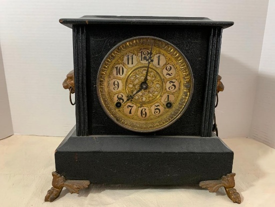 Ornate Wood and Brass Lion Paw Wind Up Clock. The Key is Attached. This is 11" Tall x 10.75" Base