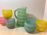 Multi Color Glass Pitcher with Set of 6 Glasses. The Glasses are 3