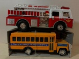2 Piece Lot of a Toy Sound Machine School Bus and a Fire Truck. They are 12