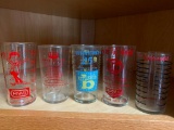 5 Piece Lot of Advertising Measuring/Drinking Glasses. Includes one from Frigidaire - As Pictured