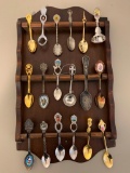 Lot of 17 Souvenir Spoons with Rack and a Bell. The Rack is 17