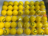 Group of Smiley Foam Rubber Face Balls in Packages