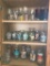 Cabinet Lot of Jelly Jars of Characters and More as Pictured