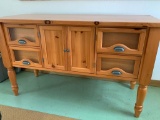 Side Buffet Cabinet w/4 Drawers. In Great Condtion.This is 3' Tall x 5' Wide x 2' Deep - As Pictured