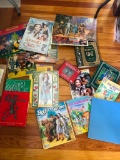 Large Group of Wizard of Oz Children's Books as Pictured and Contemporary Metal Signs