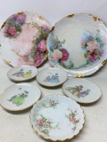 Lot of 7 Decorative Porcelain Plates. The Largest is 8