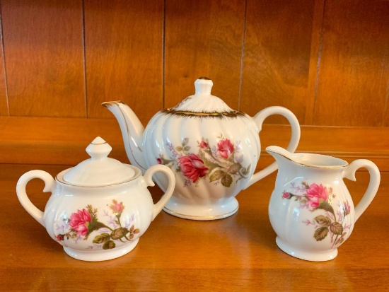 Napco Porcelain China Tea Pot, Creamer and Sugar Bowl. The Tallest is 6" Tall - As Pictured
