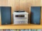 Yamaha CRX -E150 CD Receiver & Speakers w/Remote. This is in Working Condition - As Pictured