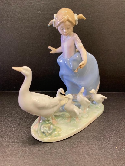 Lladro "Hurry Now" #5503. This is 7" Tall - As Pictured