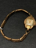 10 KT Gold Cased Benrus Ladies Wristwatch. The Band is Gold Filled - As Pictured