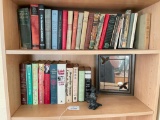 2 Shelves of Books in Basement - As Pictured