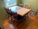 Kitchen Dining w/Tile Top Table w/4 Chairs. The Table is 30