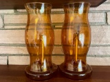 Pair of Amber Glass Oil Lamps. They are 13