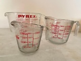 Set of 3 Glass Measuring Cups by Anchor Hocking & Pyrex. Largest is 2 L - As Pictured