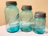 Set of 3 Vintage Blue Glass Mason Jars w/Metal Lids. The Tallest is 8.5