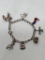 Sterling Silver Charm Bracelet. Weighs 27.2 Grams - As Pictured