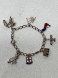 Sterling Silver Charm Bracelet. Weighs 27.2 Grams - As Pictured