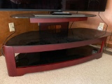 2-Tier Wood and Glass TV Stand. This is 21