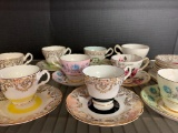 Set of 11 Porcelain Tea Cups & Saucers - As Pictured