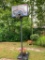 Basketball Hoop w/Net by Lifetime. Been Outside for Many Years, But Still Has Life Left- As Pictured