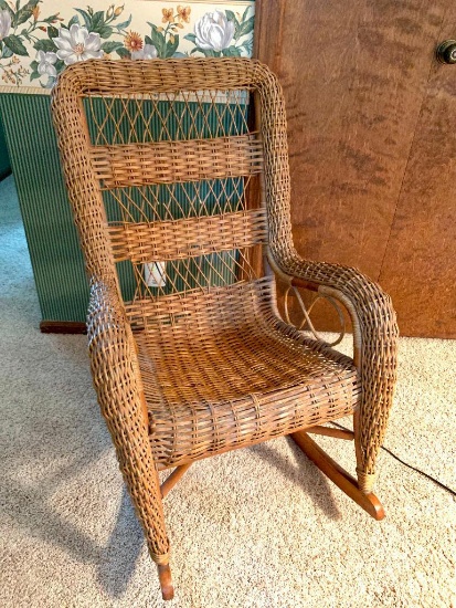 Wicker Rocker. This has Many Spindles Broken. This is 38" T x 27" W x 17" D - As Pictured