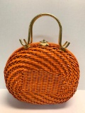 Ladies Plastic Coated Wicker Handbag w/Metal Handles. This is 10