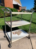 Three Shelf Metal Rolling Cart. Has Some Damage on Bottom Shelf. This is 32