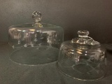 Pair of Glass Cheeseball & Cake Domes. The Largest is 10