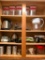 4 Shelf Kitchen Cabinet Lot Incl Canisters, Pyrex Measuring Cups, Egg Cookers, Brita Pitcher & More