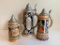 3 German Beer Steins. One is a Music Box. The Tallest is 11
