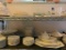 Two Shelf Lot Incl Plates, Cups, Bowls, & More - As Pictured