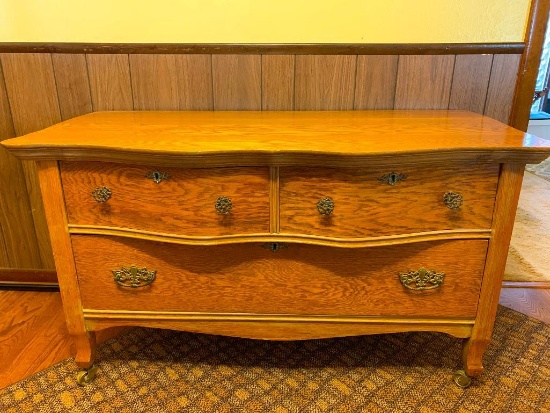 3 Drawer Antique Oak Serpentine Front Low Boy Dresser on Casters. This is 25" T x 44" W x 20" D