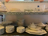 Two Shelf Lot Incl Plates, Cups, Bowls, & More - As Pictured