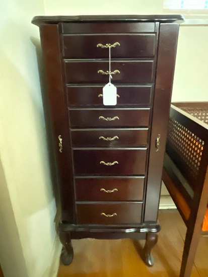 8 Drawer Jewelry Armoire by the Powell Collection. Top is Unhinged. This is 41" T x 18" W x 15" D