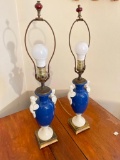 Nice Pair of Glass Lamps with Figural Designs on the Sides of them