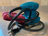 Makita Palm Sander. Plugged in & Working