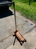 Floor Jack that we used to jack up boat! It seems to work fine! Not sure of weight, it has worn off.