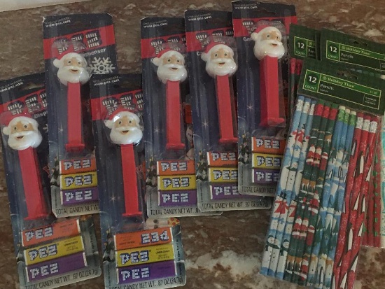 Group of Santa Pez Dispensers and Christmas Theme Pencils New in Package