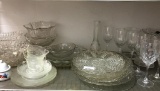 Shelf Lot of Misc Glass Items Incl Serving Plates, Wine Glasses, Bowls and More